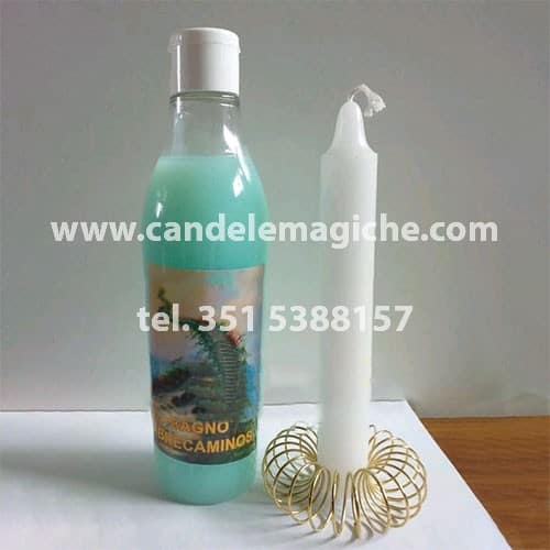 bottiglia di fluido per bagno purificatorio abre caminos e una candela bianca