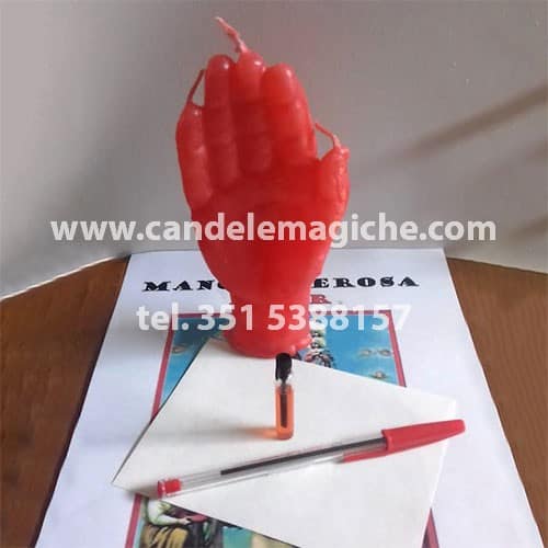 candela a forma di mano rossa per rituale