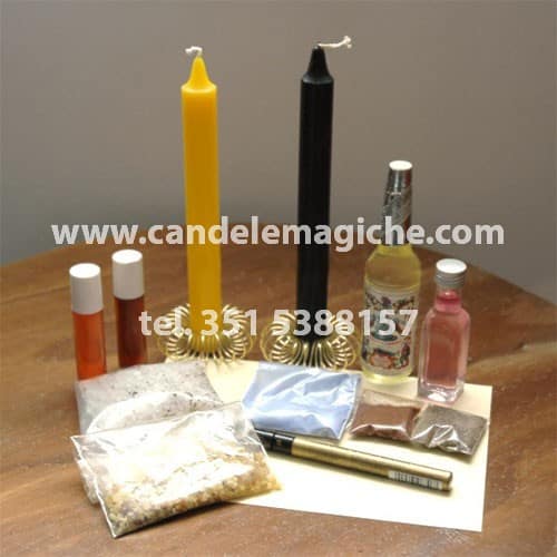 una candela gialla ed una nera ed oli per svolgere il rito della vittoria