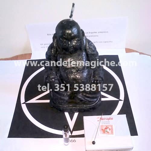candela nera a forma di buddha per svolgere il rituale del buddha nero
